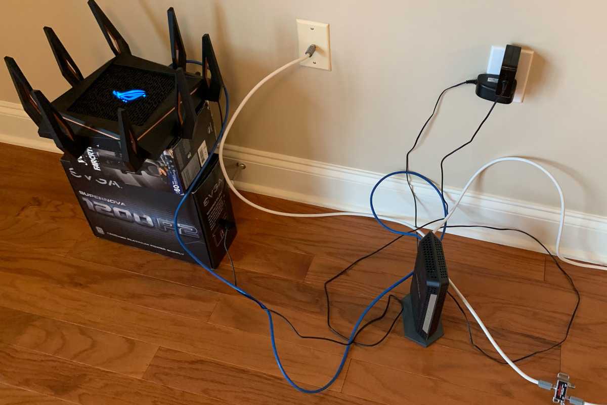 Massive gaming network router with a mess of cables and cords